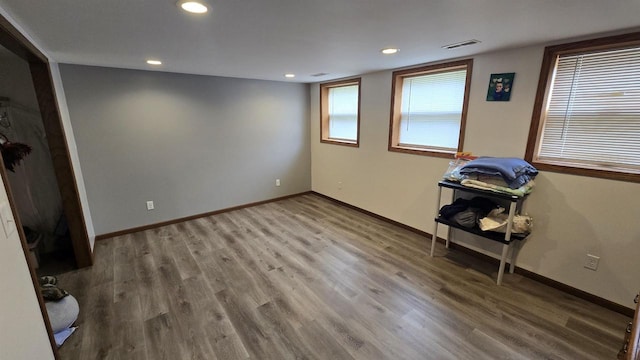 510 N Monroe St, Lancaster, WI 53813 - unfurnished bedroom featuring wood finished floors, baseboards, and recessed lighting
