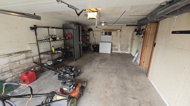 510 N Monroe St, Lancaster, WI 53813 - garage with refrigerator and freestanding refrigerator