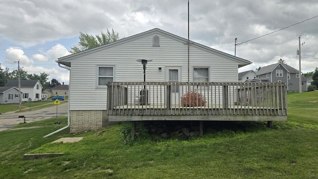 510 N Monroe St, Lancaster, WI 53813 - back of property featuring a deck and a lawn
