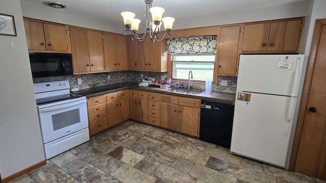 510 N Monroe St, Lancaster, WI 53813 - kitchen featuring black appliances, a sink, dark countertops, and backsplash
