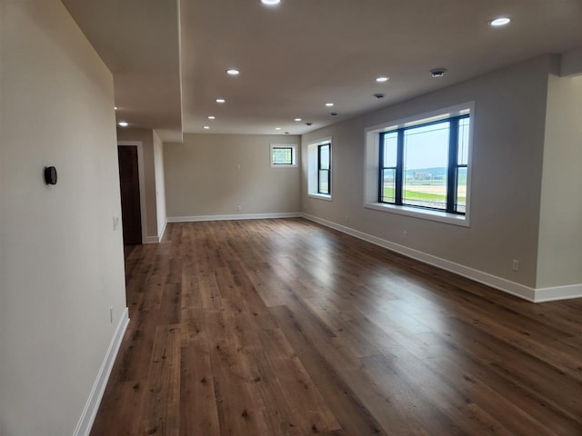 1100 Moll Dr, Waunakee, WI 53597 - spare room with recessed lighting, dark wood-type flooring, and baseboards
