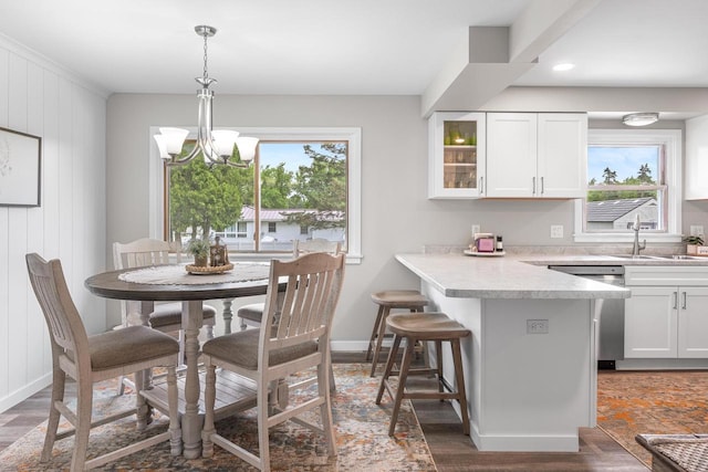 30 Highland Ave, Ripon, WI 54971 - dining area with a chandelier, baseboards, wood finished floors, and recessed lighting