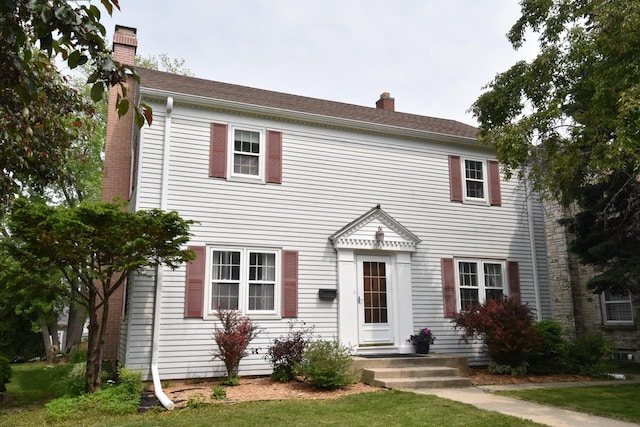 3330 S 47th St, Greenfield, WI 53219 - colonial home featuring a chimney