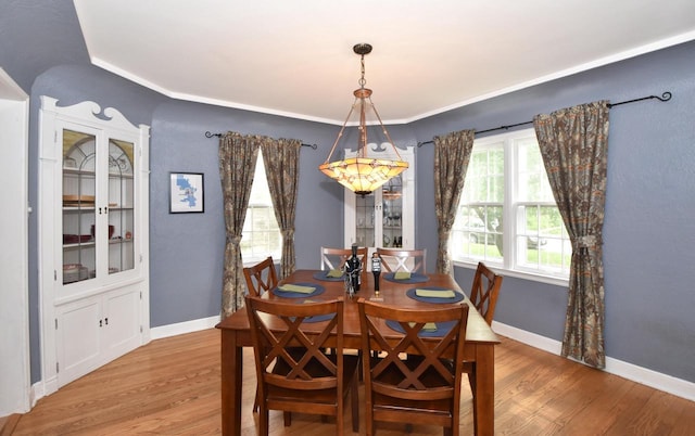 3330 S 47th St, Greenfield, WI 53219 - dining area with wood finished floors and baseboards