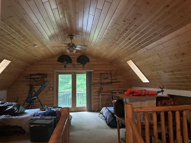 58875 Roy Anderson Rd, Mason, WI 54856 - bedroom with carpet, vaulted ceiling, access to exterior, wooden ceiling, and a skylight