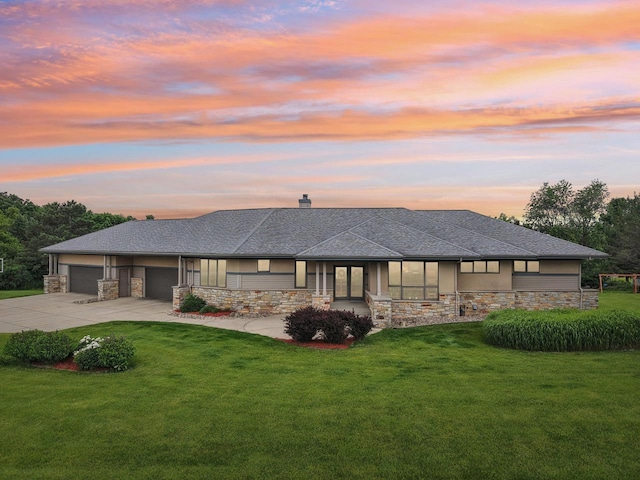 7965 Westhill Cir, Verona, WI 53593 - prairie-style home featuring stone siding, driveway, and a front lawn