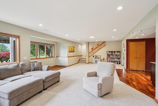 7965 Westhill Cir, Verona, WI 53593 - living room featuring recessed lighting, stairway, wood finished floors, baseboards, and carpet flooring