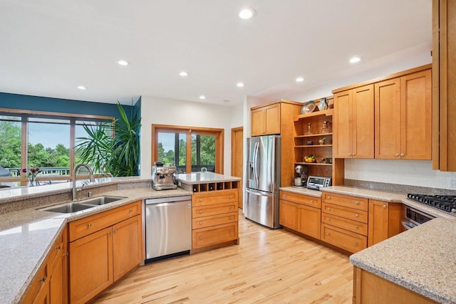7965 Westhill Cir, Verona, WI 53593 - kitchen featuring appliances with stainless steel finishes, a sink, open shelves, plenty of natural light, and recessed lighting
