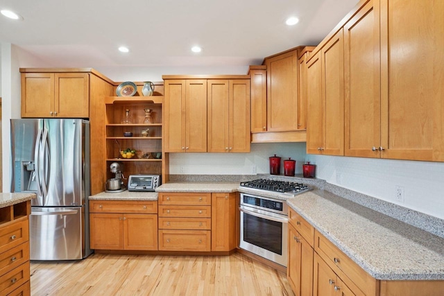 7965 Westhill Cir, Verona, WI 53593 - kitchen with stainless steel appliances, open shelves, light wood-style floors, light stone counters, and recessed lighting