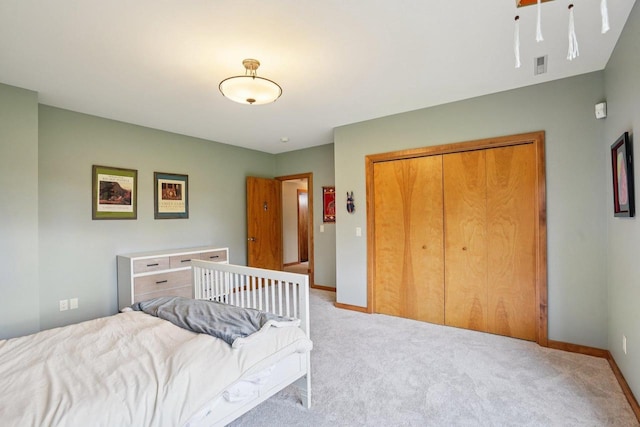 7965 Westhill Cir, Verona, WI 53593 - bedroom featuring light carpet, baseboards, and a closet