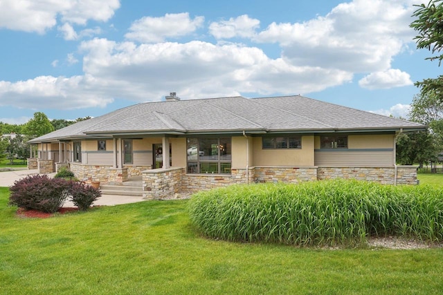 7965 Westhill Cir, Verona, WI 53593 - view of front facade featuring a front yard, stone siding, stucco siding, and a porch