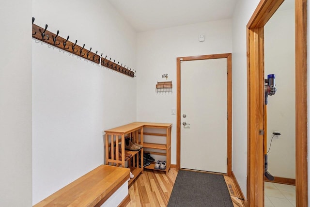 7965 Westhill Cir, Verona, WI 53593 - mudroom featuring baseboards and light wood-style flooring