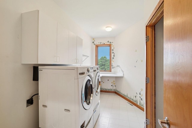 7965 Westhill Cir, Verona, WI 53593 - washroom with cabinet space, separate washer and dryer, baseboards, and light flooring
