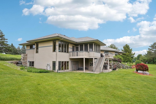 7965 Westhill Cir, Verona, WI 53593 - rear view of property with a sunroom, stairway, a deck, and a lawn