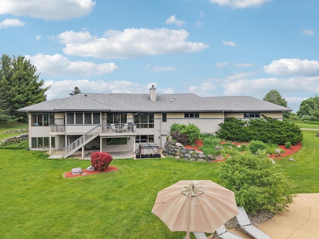7965 Westhill Cir, Verona, WI 53593 - back of property featuring a sunroom, stairway, a yard, a patio, and roof with shingles