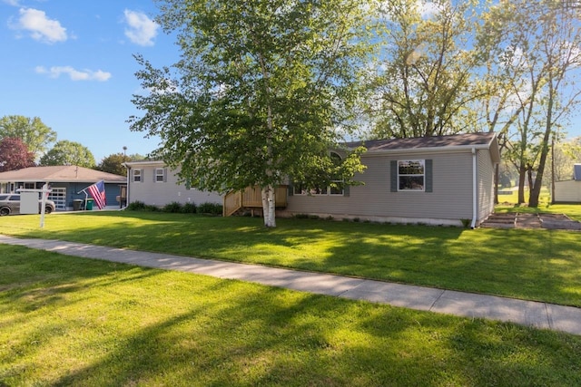 227 Cedar St, Ripon, WI 54971 - view of front of house with a front lawn