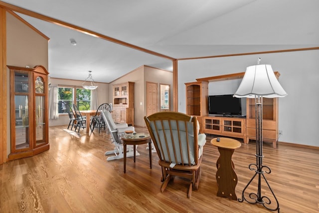 227 Cedar St, Ripon, WI 54971 - living room with light wood-type flooring, lofted ceiling, and baseboards