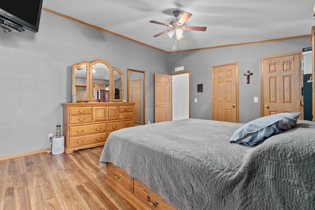 227 Cedar St, Ripon, WI 54971 - bedroom with light wood-style floors, crown molding, a ceiling fan, and baseboards