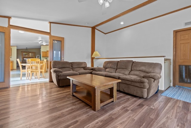 227 Cedar St, Ripon, WI 54971 - living area featuring wood finished floors, ceiling fan, and ornamental molding