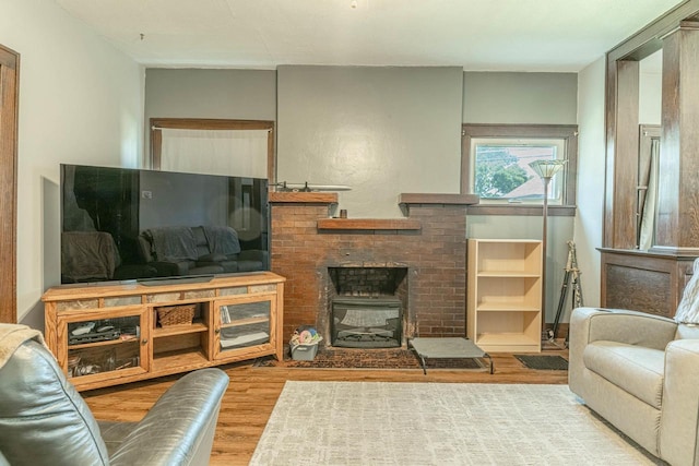 1600 15th Ave, Monroe, WI 53566 - living room with wood finished floors and a fireplace