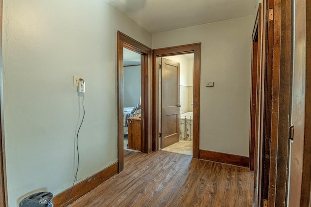 1600 15th Ave, Monroe, WI 53566 - corridor featuring wood finished floors and baseboards