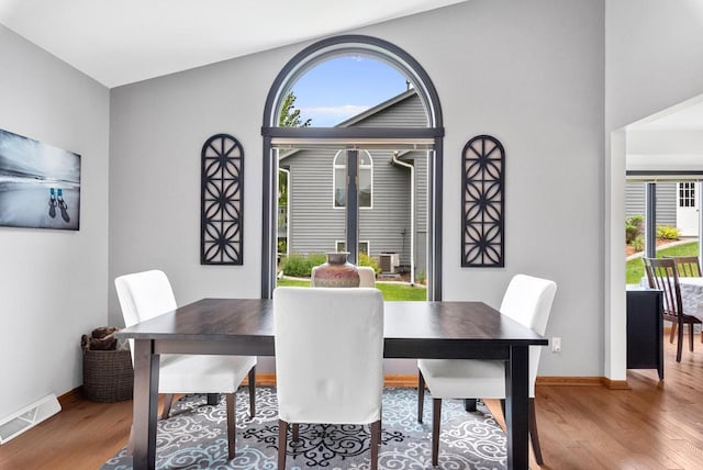 1300 Hidden Fields Dr, West Bend, WI 53095 - dining area featuring wood finished floors and baseboards