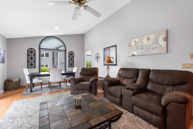1300 Hidden Fields Dr, West Bend, WI 53095 - living area with lofted ceiling, ceiling fan, and wood finished floors