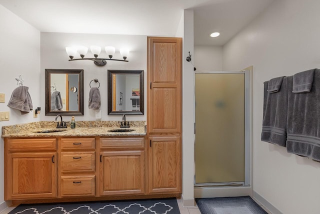 1300 Hidden Fields Dr, West Bend, WI 53095 - bathroom with a shower stall and double vanity