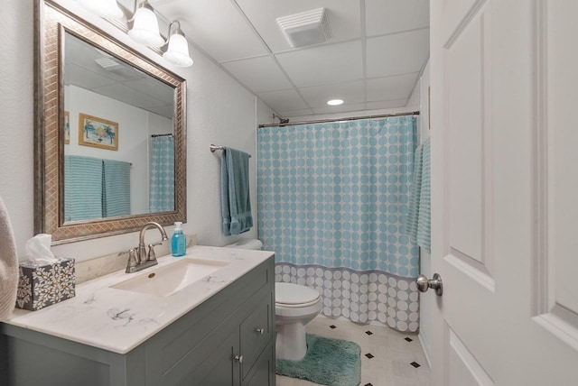 1300 Hidden Fields Dr, West Bend, WI 53095 - full bathroom with vanity, tile patterned floors, a paneled ceiling, curtained shower, and recessed lighting