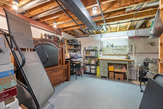 1300 Hidden Fields Dr, West Bend, WI 53095 - unfinished basement with a workshop area
