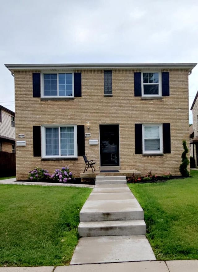 3153 S 39th St, Milwaukee, WI 53215 - view of front of house with brick siding and a front lawn