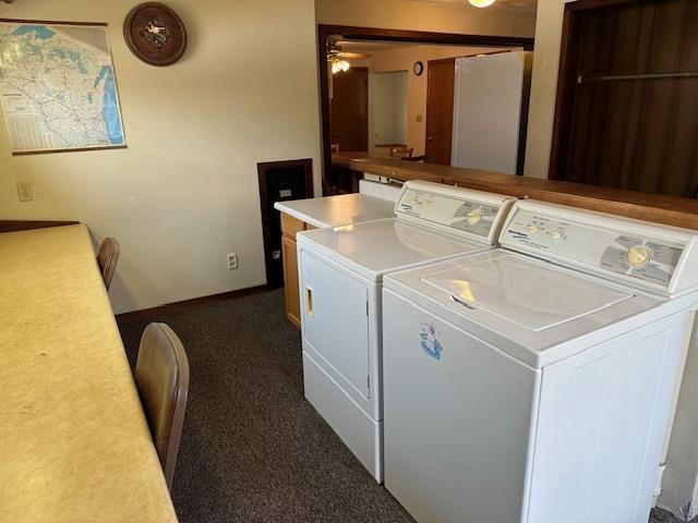 420 Jackson St, Waupun, WI 53963 - washroom with washing machine and dryer, dark colored carpet, ceiling fan, and baseboards