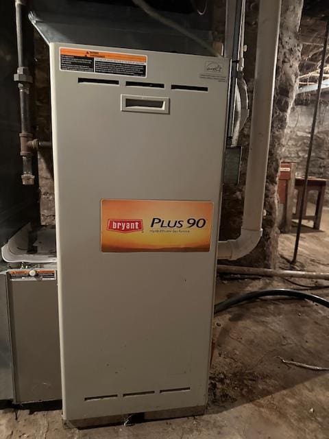 420 Jackson St, Waupun, WI 53963 - utility room featuring heating unit