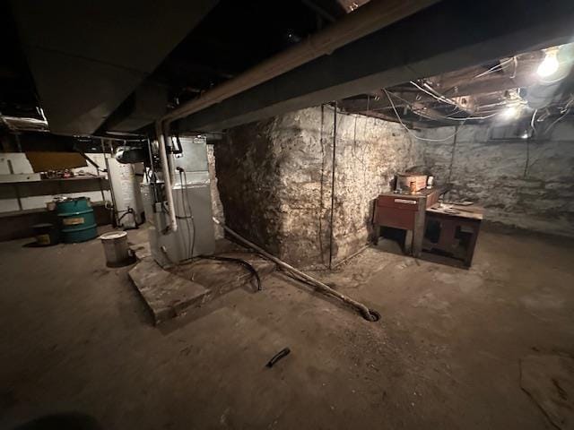 420 Jackson St, Waupun, WI 53963 - unfinished basement featuring heating unit
