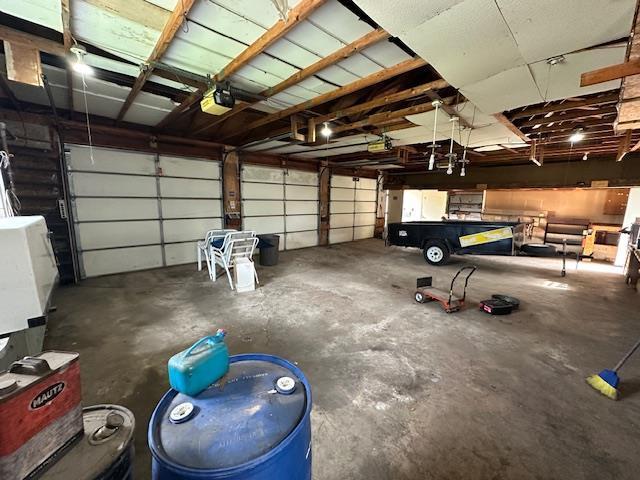 420 Jackson St, Waupun, WI 53963 - garage featuring a garage door opener