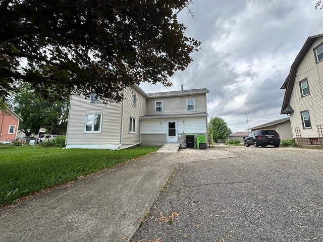 420 Jackson St, Waupun, WI 53963 - view of front facade with asphalt driveway