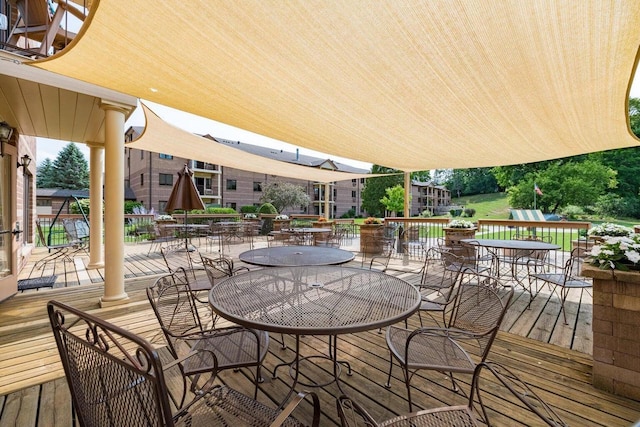 530 N Silverbrook Dr Unit 121, West Bend, WI 53090 - deck featuring outdoor dining area
