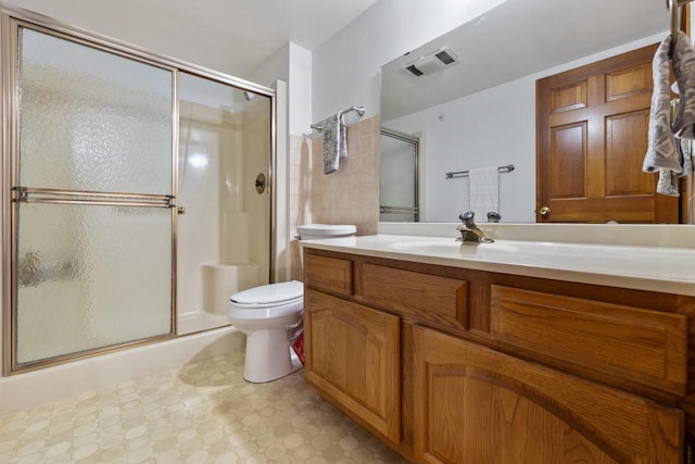 530 N Silverbrook Dr Unit 121, West Bend, WI 53090 - bathroom featuring a shower stall, vanity, and tile patterned floors