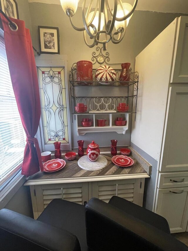 3915 N 23rd St, Milwaukee, WI 53206 - dining space with a chandelier