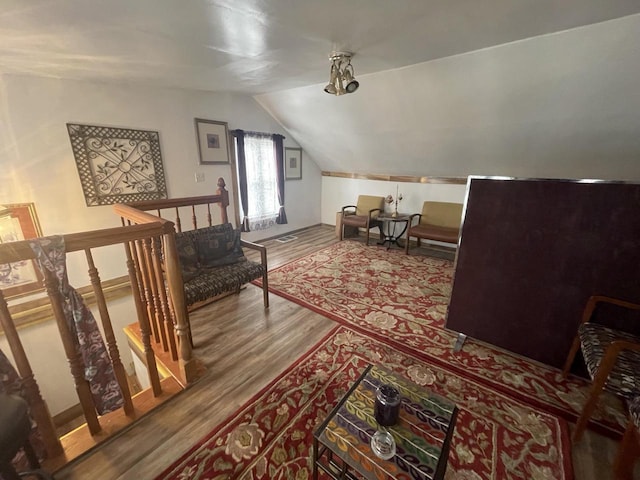 3915 N 23rd St, Milwaukee, WI 53206 - bonus room featuring wood finished floors and vaulted ceiling