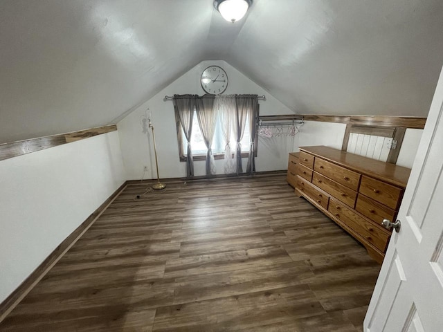 3915 N 23rd St, Milwaukee, WI 53206 - additional living space with dark wood-style flooring and vaulted ceiling