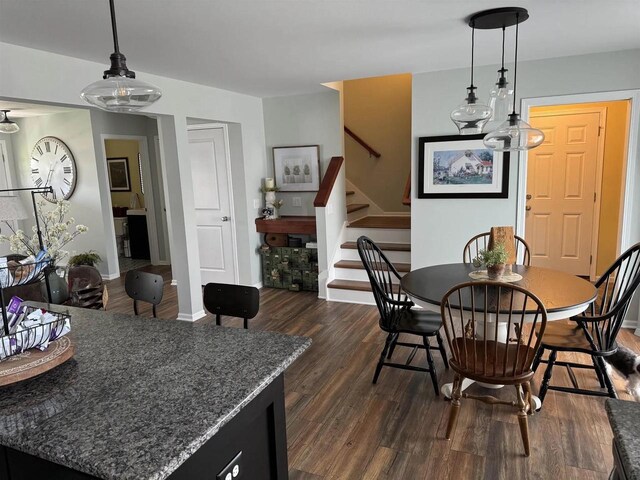 342 E Chapel Royal Dr, Verona, WI 53593 - dining area featuring dark wood-type flooring and stairway
