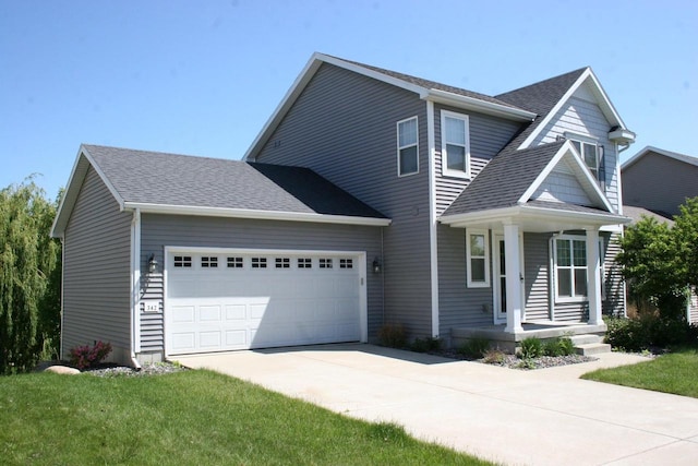 342 E Chapel Royal Dr, Verona, WI 53593 - view of front of home featuring driveway, a porch, an attached garage, and roof with shingles