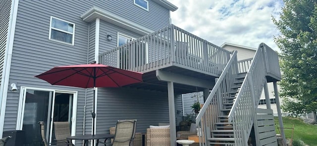 342 E Chapel Royal Dr, Verona, WI 53593 - back of house with stairs and a wooden deck