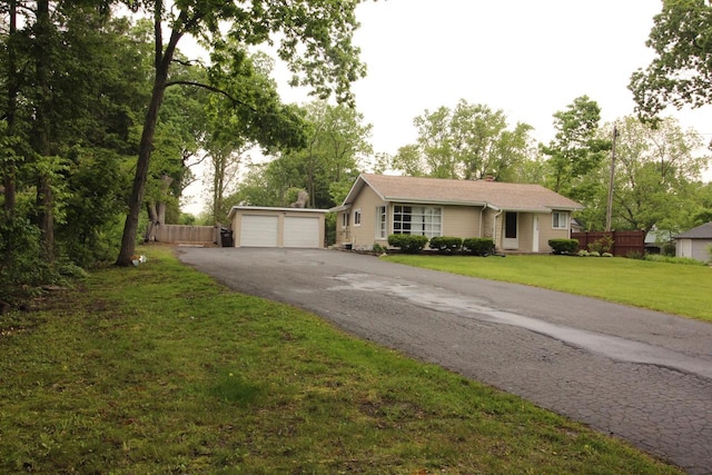 4726 N Green Bay Rd, Racine, WI 53404 - single story home with an outbuilding and a garage