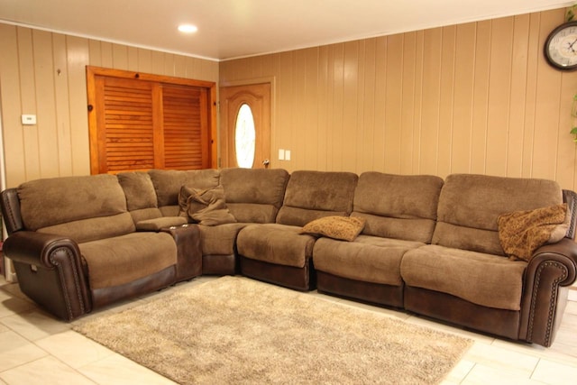 4726 N Green Bay Rd, Racine, WI 53404 - living area featuring light tile patterned floors, crown molding, wooden walls, and recessed lighting