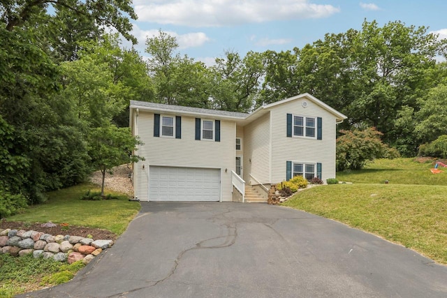 34116 Valley Dr, Burlington, WI 53105 - traditional home with asphalt driveway, a garage, and a front lawn