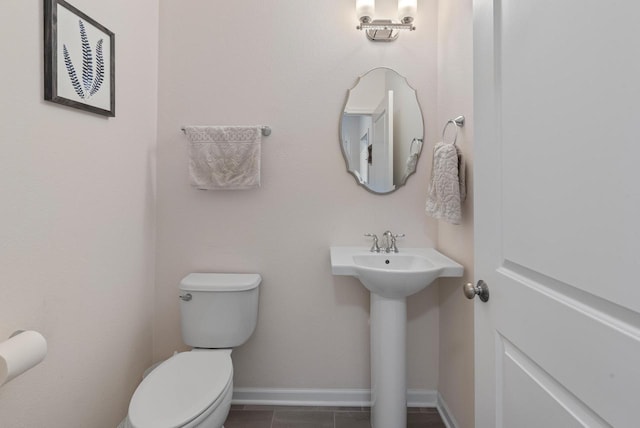 6028 Star Grass Ln, Racine, WI 53406 - bathroom with toilet and tile patterned flooring