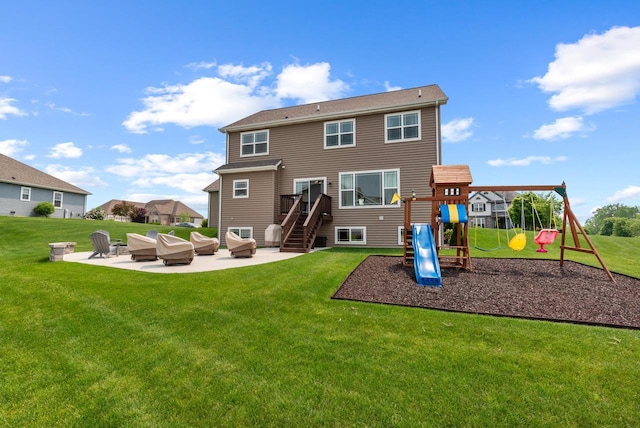 6028 Star Grass Ln, Racine, WI 53406 - back of property with a patio, a lawn, a playground, and stairs