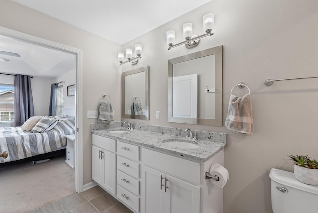 6028 Star Grass Ln, Racine, WI 53406 - ensuite bathroom with double vanity and toilet